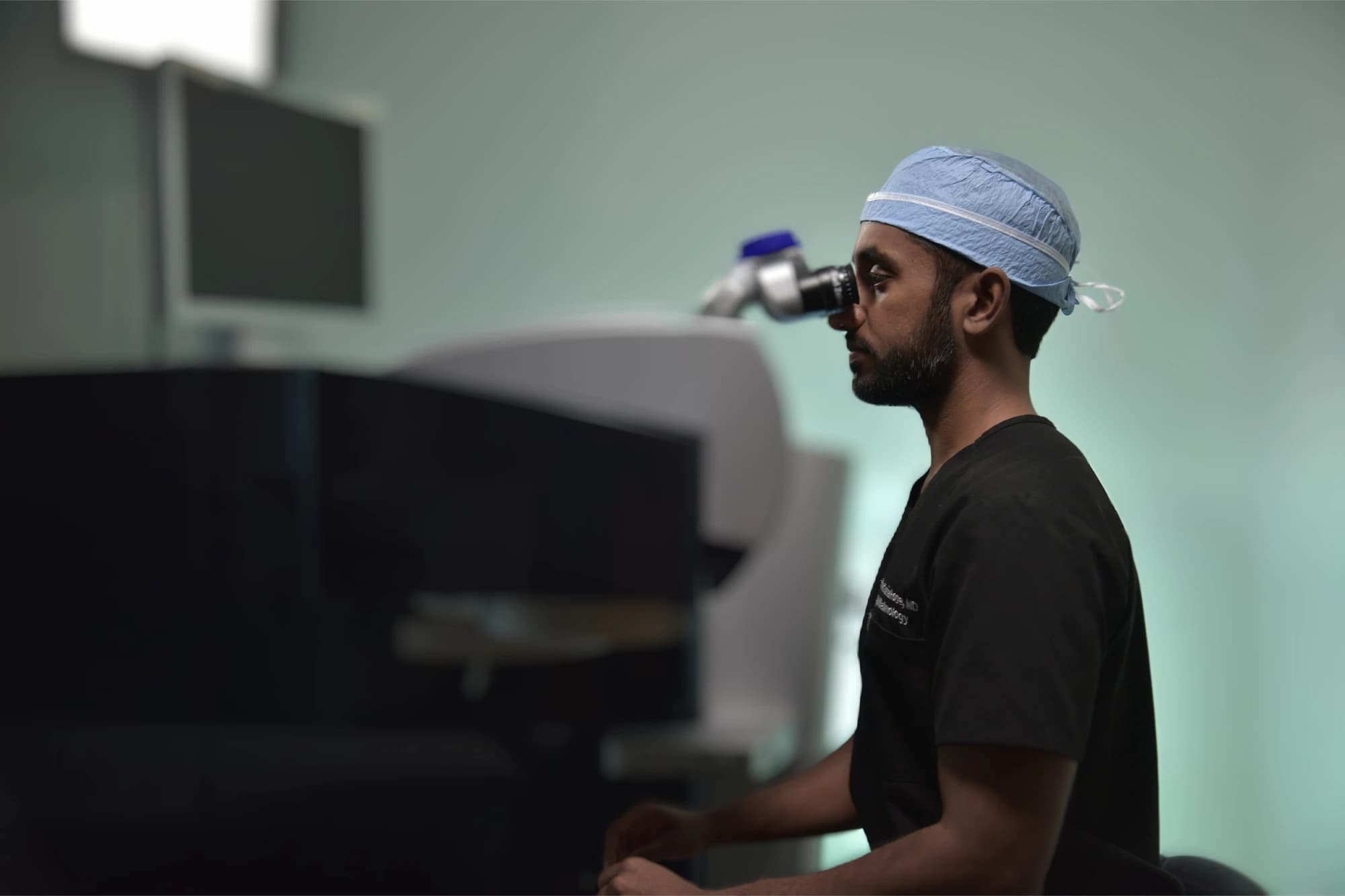 Dr. Robin Kuriakose at the laser in Optima Eye's on-site surgery centre in Hayward.